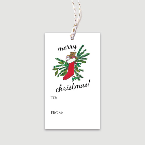 A Merry Christmas stocking and evergreens will adorn your wrapped gift with festive metallic ties and space to fill in 